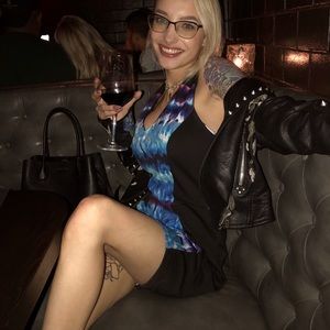 I.N. San Francisco form fitting dress with colorful middle and back stripe.